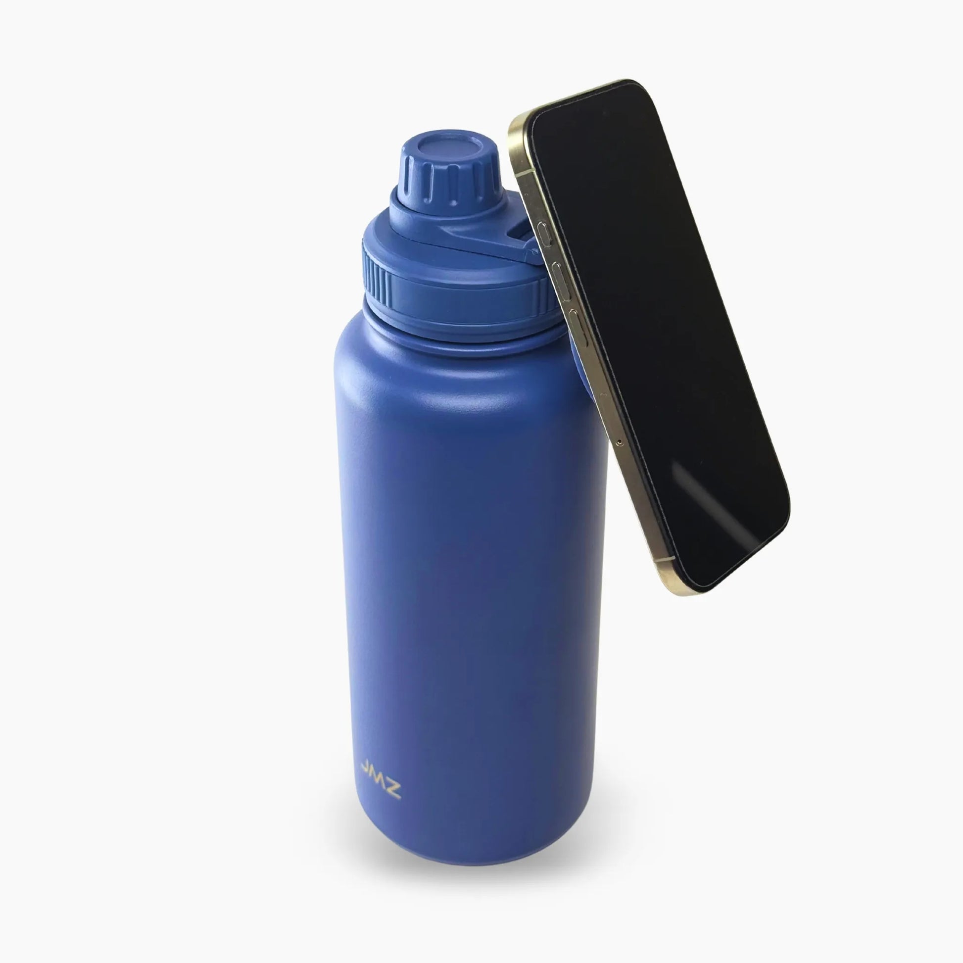 Eclipse Bottle color azul (Blue) de 32 oz. Tomatodo magnético de acero inoxidable que sujeta tu smartphone. Perfecto para ver rutinas de ejercicio o series mientras te hidratas. Incluye imán extra para el celular. Hacemos envíos seguros a todo el Perú (Costa, Sierra y Selva) - JMZ.