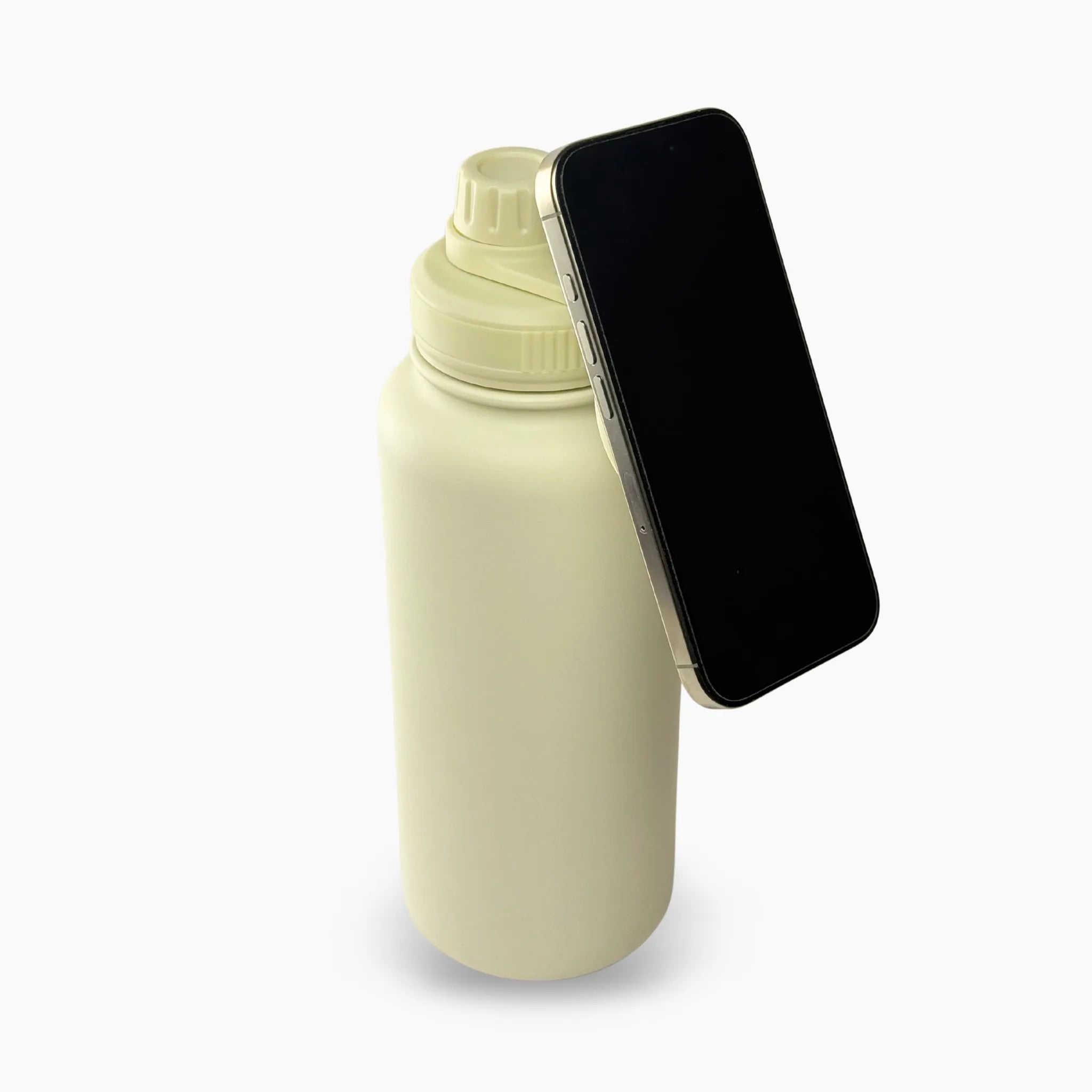 Eclipse Bottle color crema (Cream) de 32 oz. Tomatodo estético con anillo magnético en la tapa para sostener tu celular. Ideal para influencers y creación de contenido sin manos. Mantiene la temperatura. Hacemos envíos seguros a todo el Perú (Costa, Sierra y Selva) - JMZ.