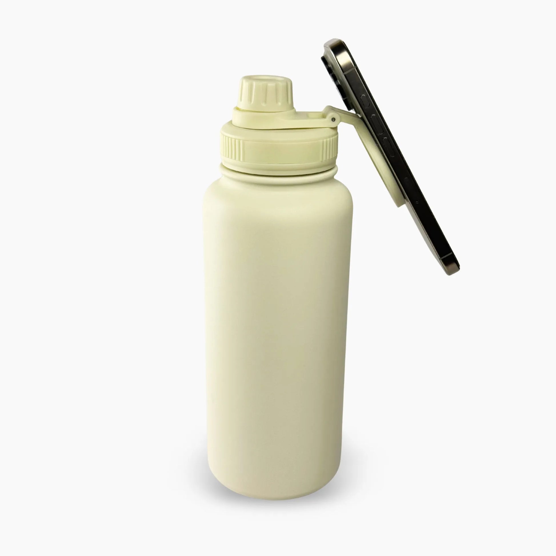 Eclipse Bottle color crema (Cream) de 32 oz. Tomatodo estético con anillo magnético en la tapa para sostener tu celular. Ideal para influencers y creación de contenido sin manos. Mantiene la temperatura. Hacemos envíos seguros a todo el Perú (Costa, Sierra y Selva) - JMZ.