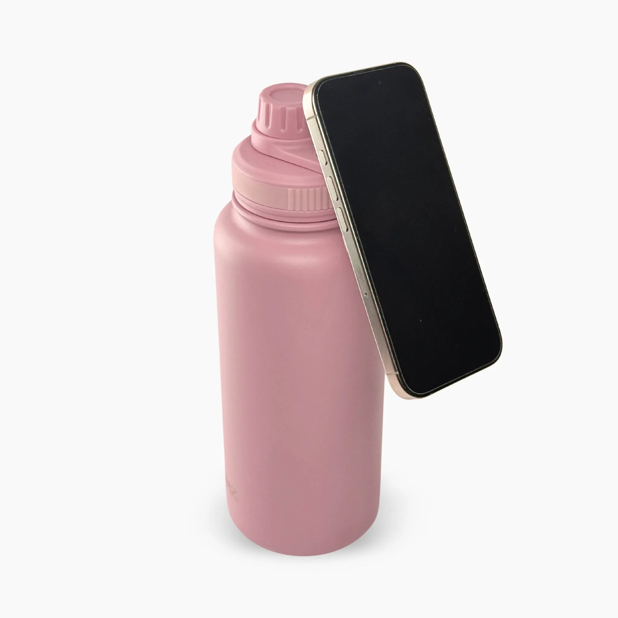 Eclipse Bottle color rosado (Pink) de 32 oz. Tomatodo con tecnología magnética para pegar tu celular en la tapa. Accesorio "must-have" para grabar TikToks o entrenar. Acero inoxidable duradero. Hacemos envíos seguros a todo el Perú (Costa, Sierra y Selva) - JMZ.