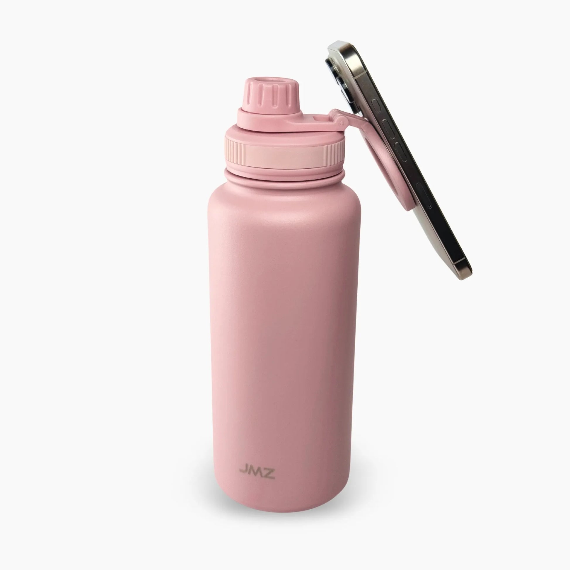 Eclipse Bottle color rosado (Pink) de 32 oz. Tomatodo con tecnología magnética para pegar tu celular en la tapa. Accesorio "must-have" para grabar TikToks o entrenar. Acero inoxidable duradero. Hacemos envíos seguros a todo el Perú (Costa, Sierra y Selva) - JMZ.